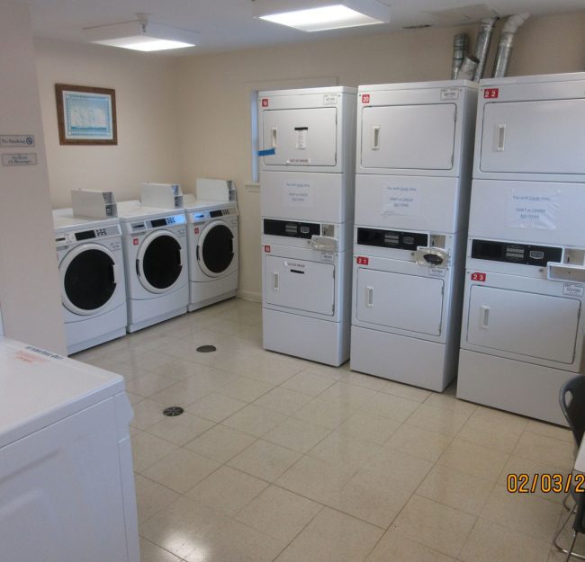 The communal laundry room at River Valley Village